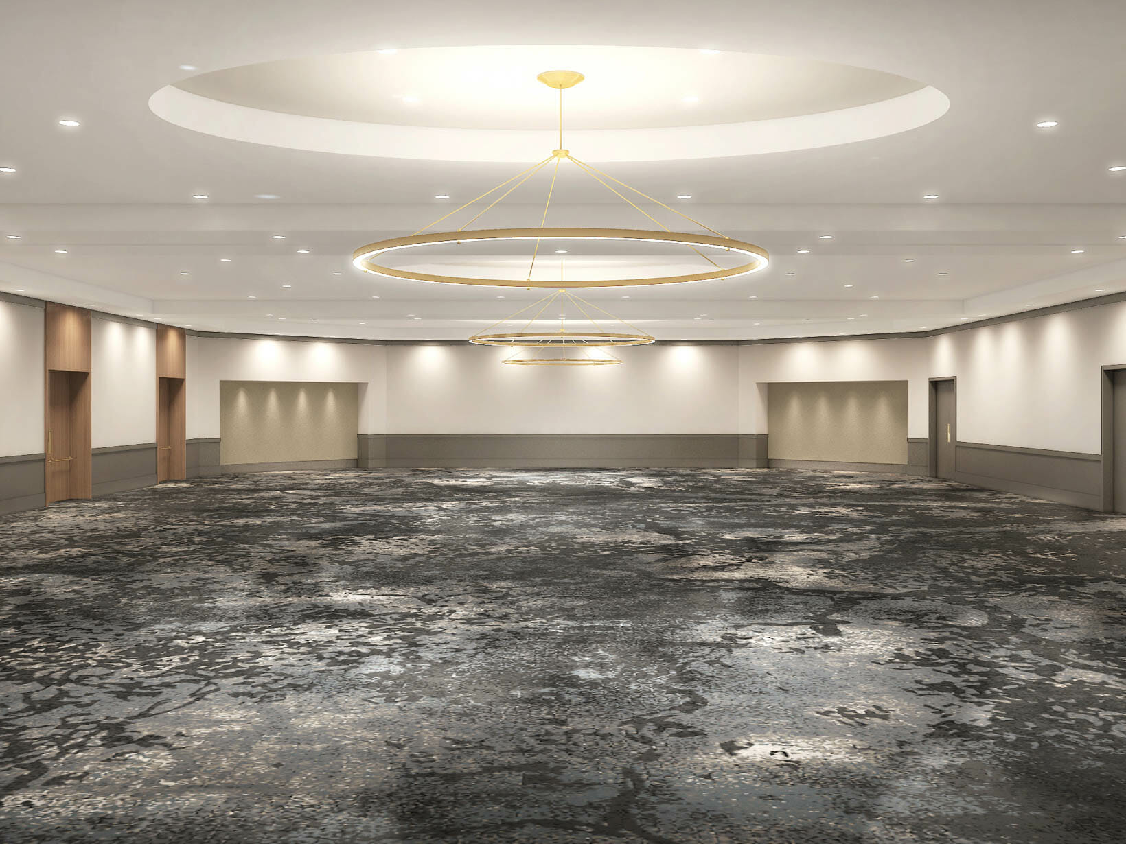 Empty meeting space with grey carpet, high ceilings, and circular chandeliers