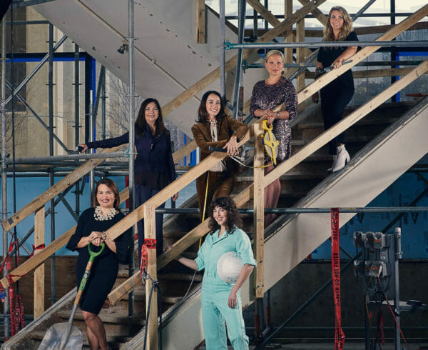 The women of C Baldwin standing in the unfinished construction of the hotel before it opened