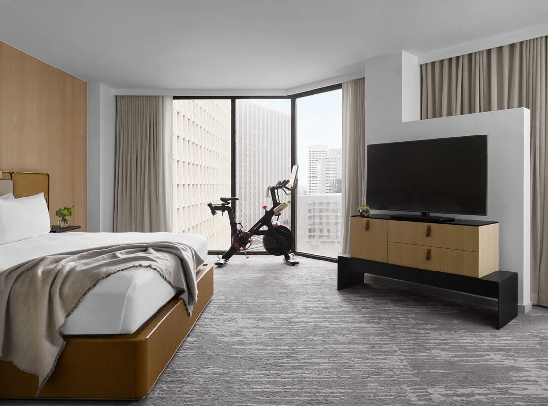 View from king bedroom with view of downtown Houston through floor to ceiling windows