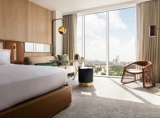 View from king bedroom with view of downtown Houston through floor to ceiling windows