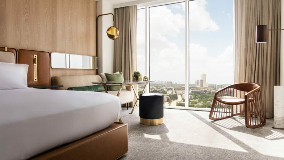 View from king bedroom with view of downtown Houston through floor to ceiling windows