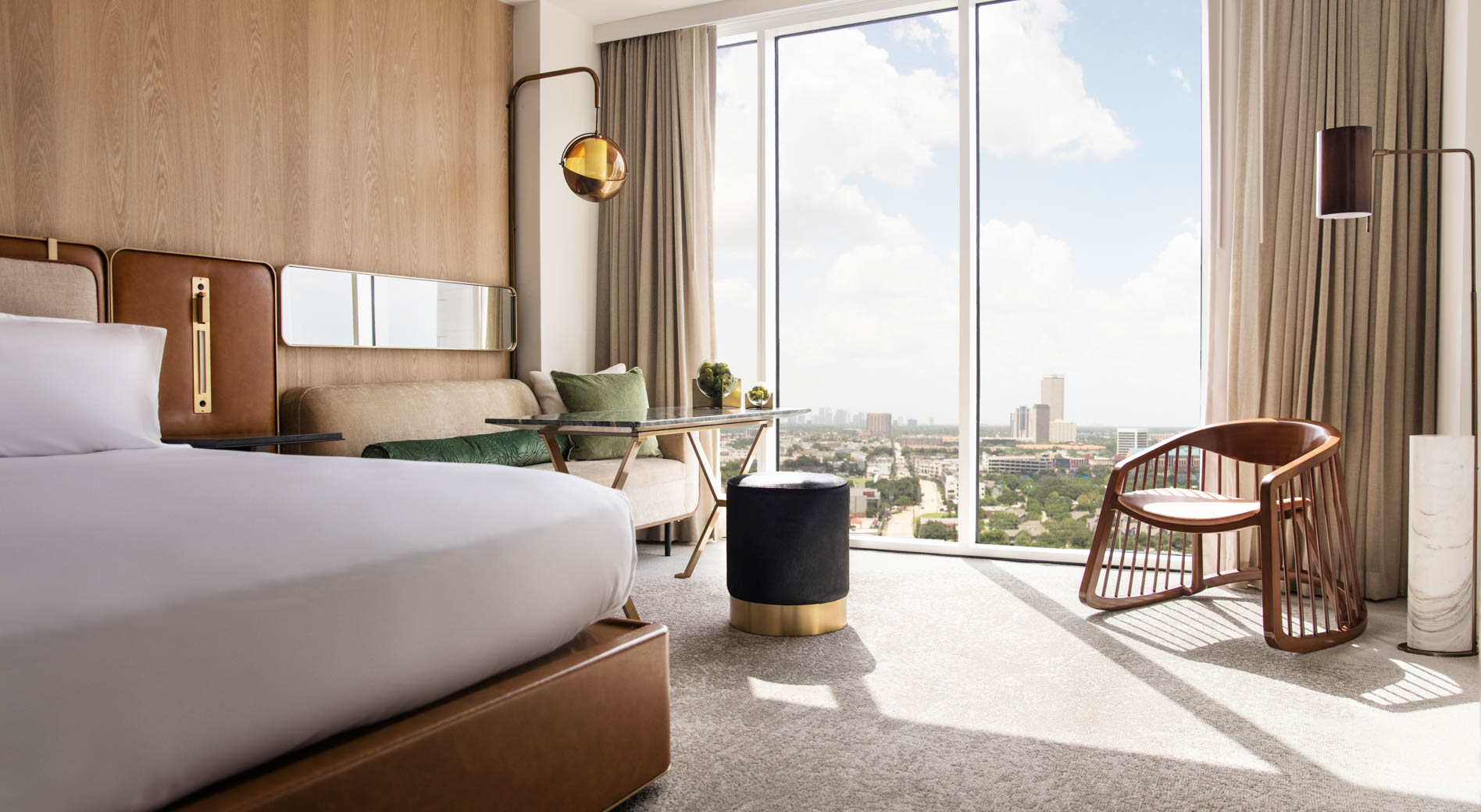 View from king bedroom with view of downtown Houston through floor to ceiling windows