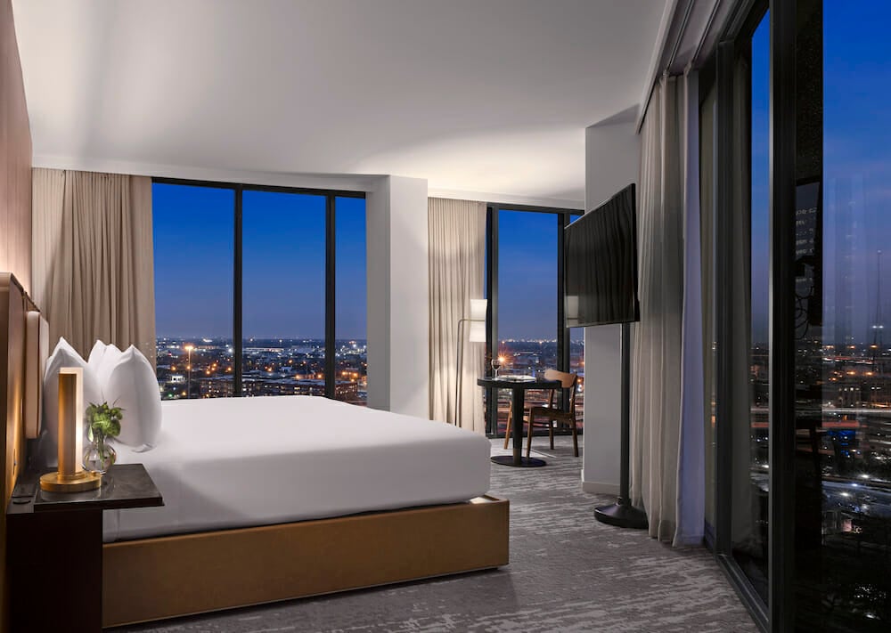 View from king bedroom with view of downtown Houston through floor to ceiling windows