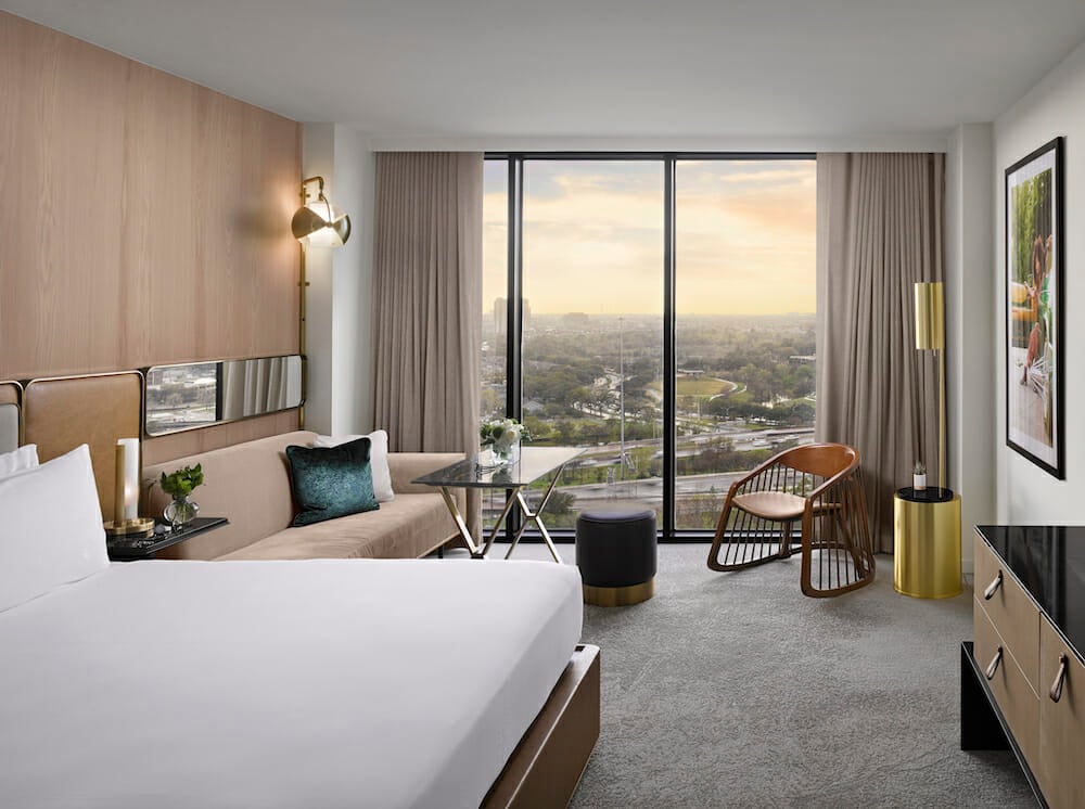 View from king bedroom with view of downtown Houston through floor to ceiling windows