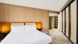 View from king bedroom with view of downtown Houston through floor to ceiling windows