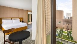 View from king bedroom with view of downtown Houston through floor to ceiling windows