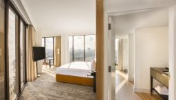 View from king bedroom with view of downtown Houston through floor to ceiling windows