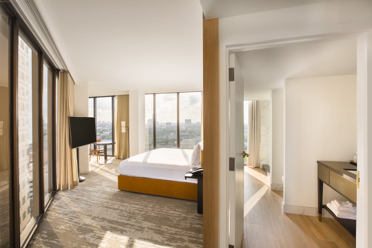 View from king bedroom with view of downtown Houston through floor to ceiling windows