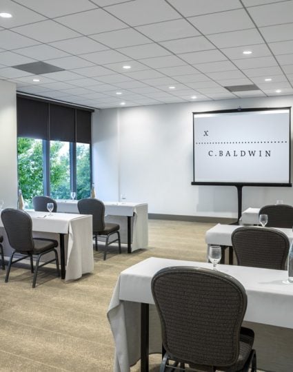 The M. Ferguson room set up for a meeting in a classroom format